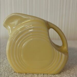 Fiesta Pale Yellow Mini Disk Pitcher. (Pale) Yellow was made from 1987 to 2002.